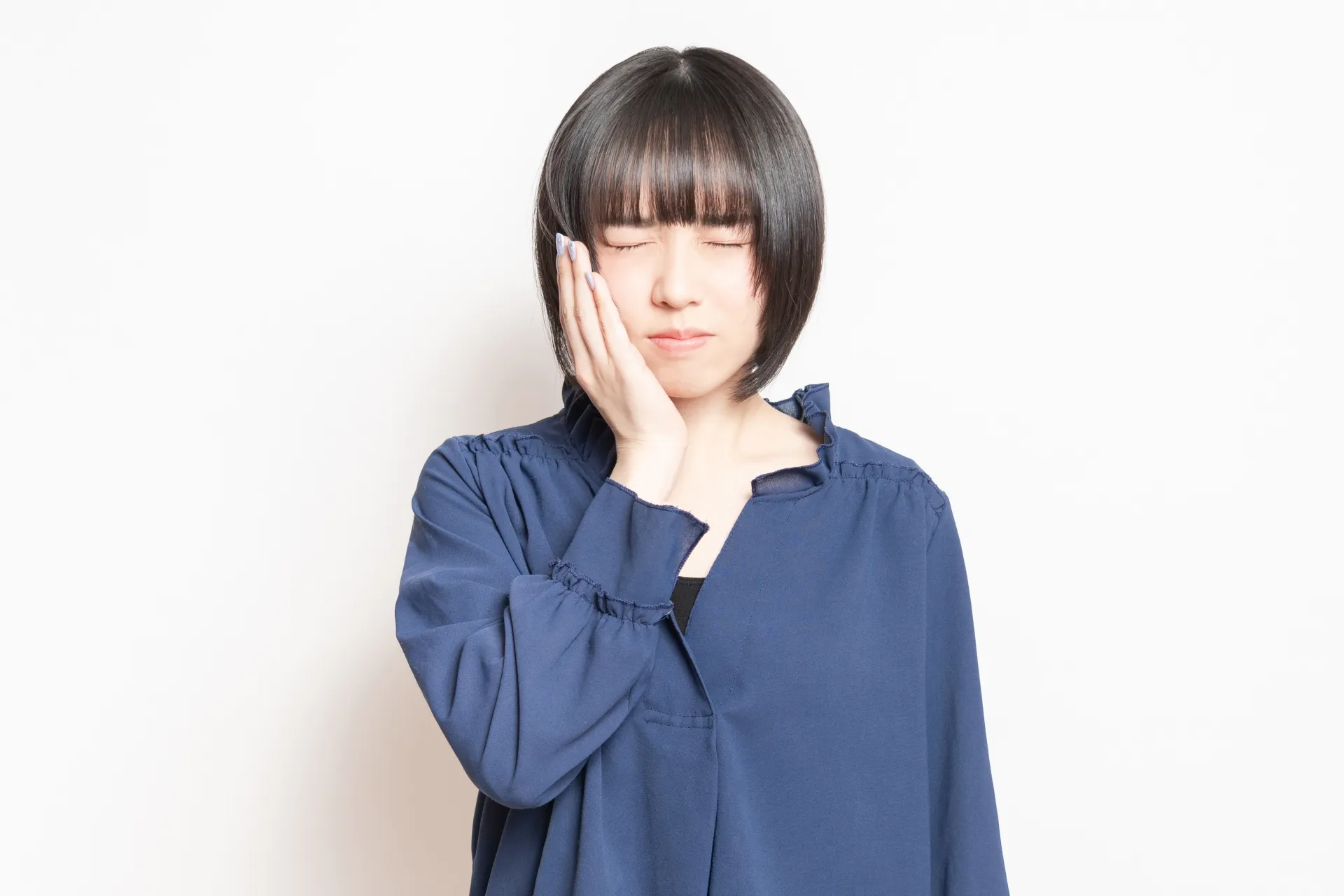 歯が痛い女性の画像