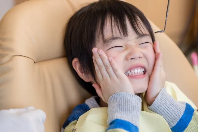 矯正中の歯の痛み